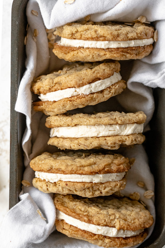 Golden oatmeal creme pies with vanilla buttercream, sandwiched between two perfect oatmeal cookies.